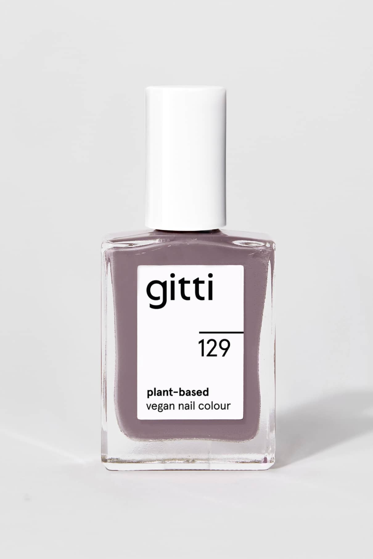 Gitti no. 129 ist eine vegane Nagelfarbe auf pflanzlicher Basis mit weißer Kappe und einem hellen mauvefarbenen Lack, der eine elegante Note in einem modernen grau-violetten Farbton verleiht.