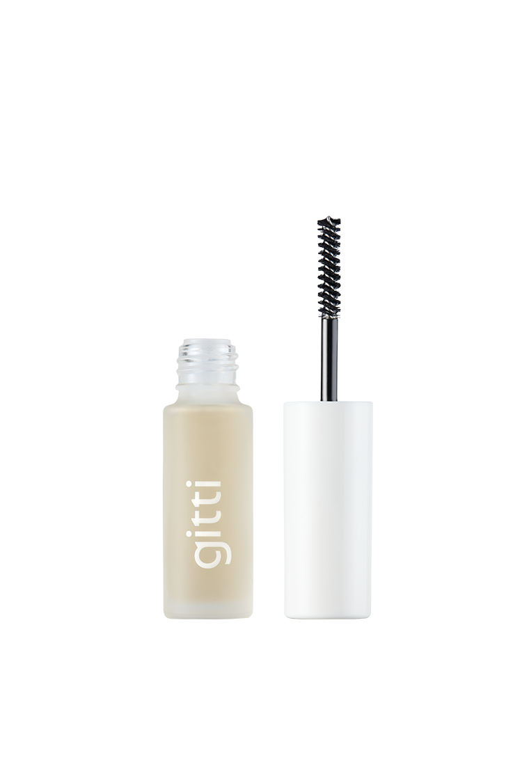Eine klare Brow Control Mascara-Tube mit weißer Kappe und Bürstenapplikator steht aufrecht auf weißem Hintergrund - perfekt als transparentes Augenbrauengel mit nicht-klebriger, leichter Textur.