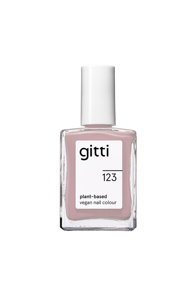 Eine Flasche gitti no. 123, eine pflanzliche, vegane Nagelfarbe in einem pastellfarbenen Lavendelton mit weißer Kappe und Etikett.