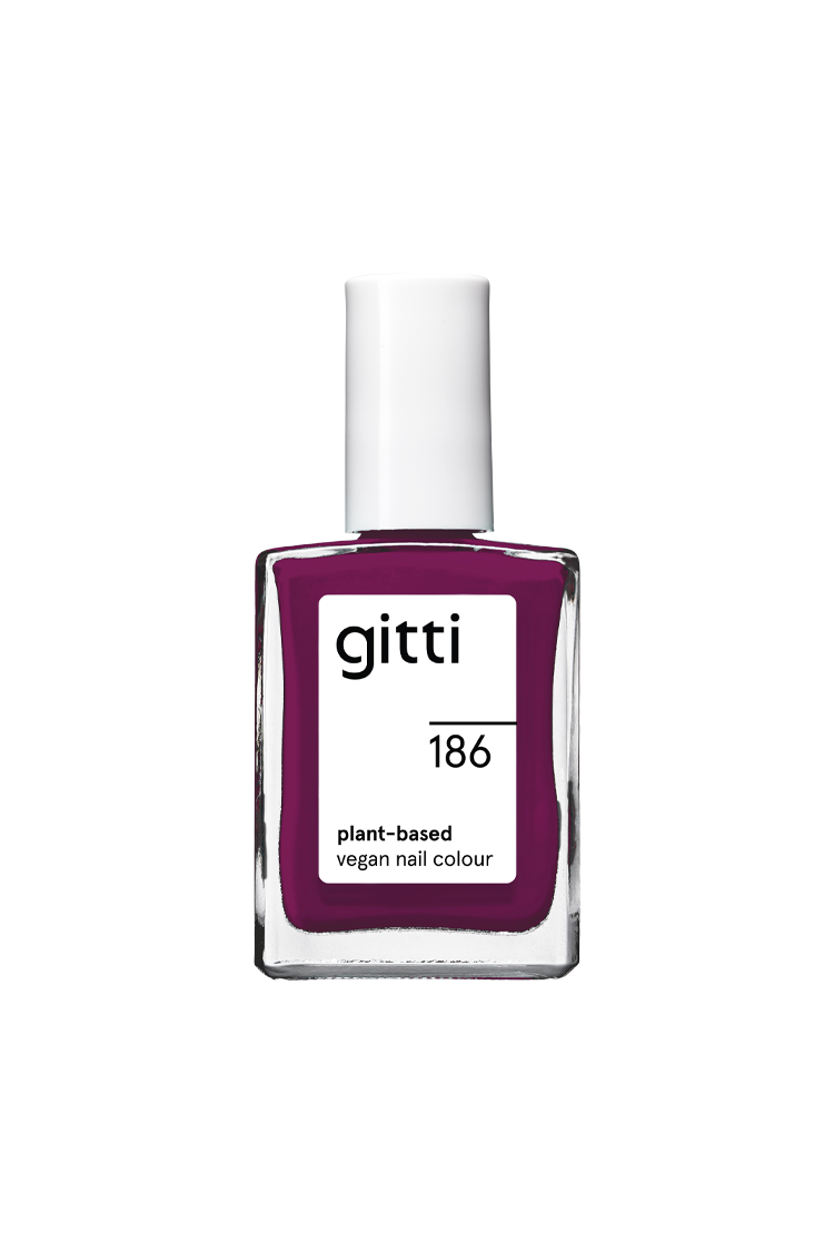Eine Flasche gitti no. 186 pflanzliche vegane Nagelfarbe mit weißem Verschluss und rechteckigem Glasbehälter mit tiefgrünem Lack.