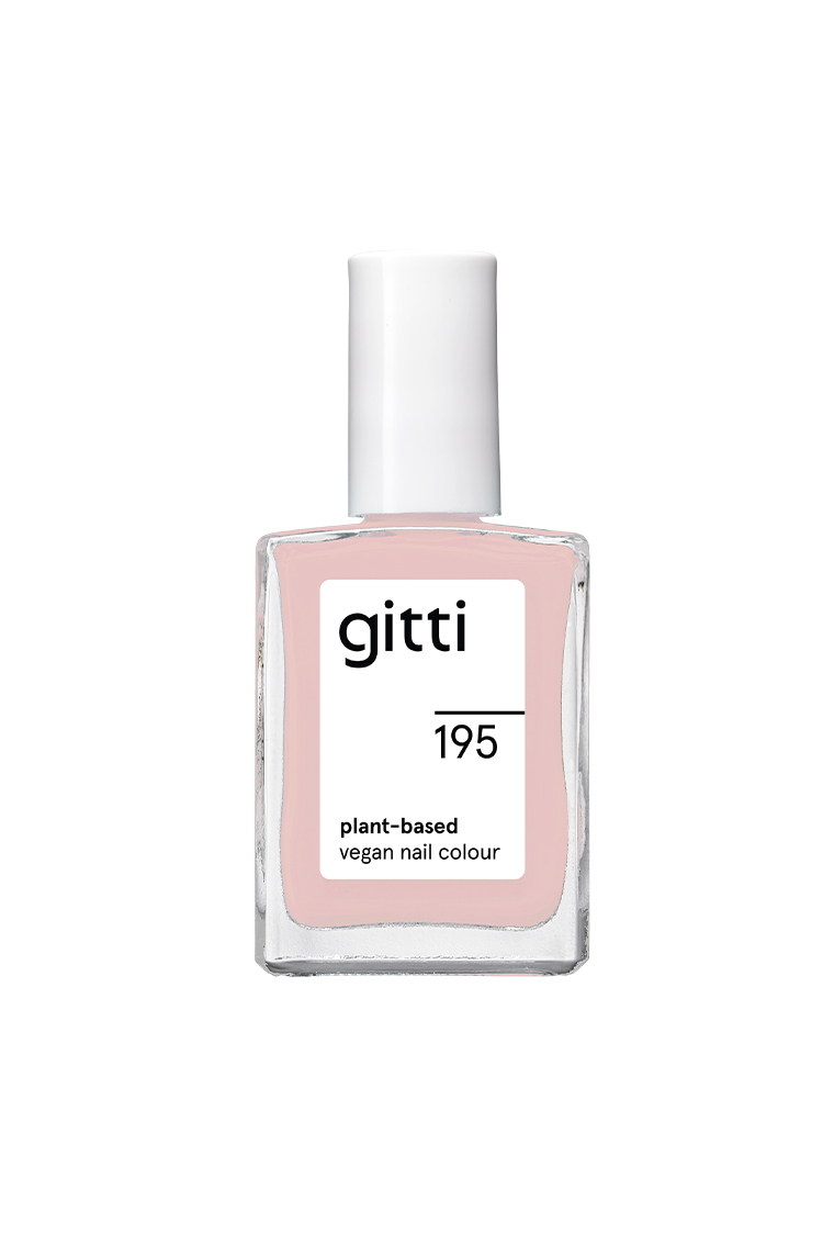 Eine Flasche gitti no. 195 pflanzliche vegane Nagelfarbe in pudriges Rosé, ein blassrosa Farbton mit weißer Kappe.