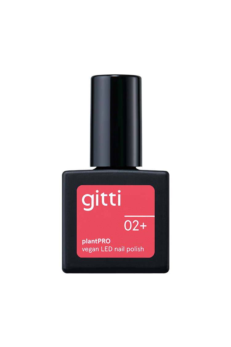 Eine Flasche gitti no. 02+, ein pflanzlicher, veganer LED-Nagellack in leuchtendem Koralle mit warmem Unterton, mit schwarzer Kappe und rotem Frontetikett.