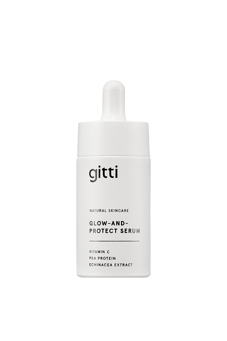Eine weiße Tropfflasche mit der Aufschrift Glow-And-Protect Serum - natürliche Hautpflege mit Vitamin C, Erbsenprotein und Echinacea-Extrakt für Feuchtigkeit und Schutz vor blauem Licht.