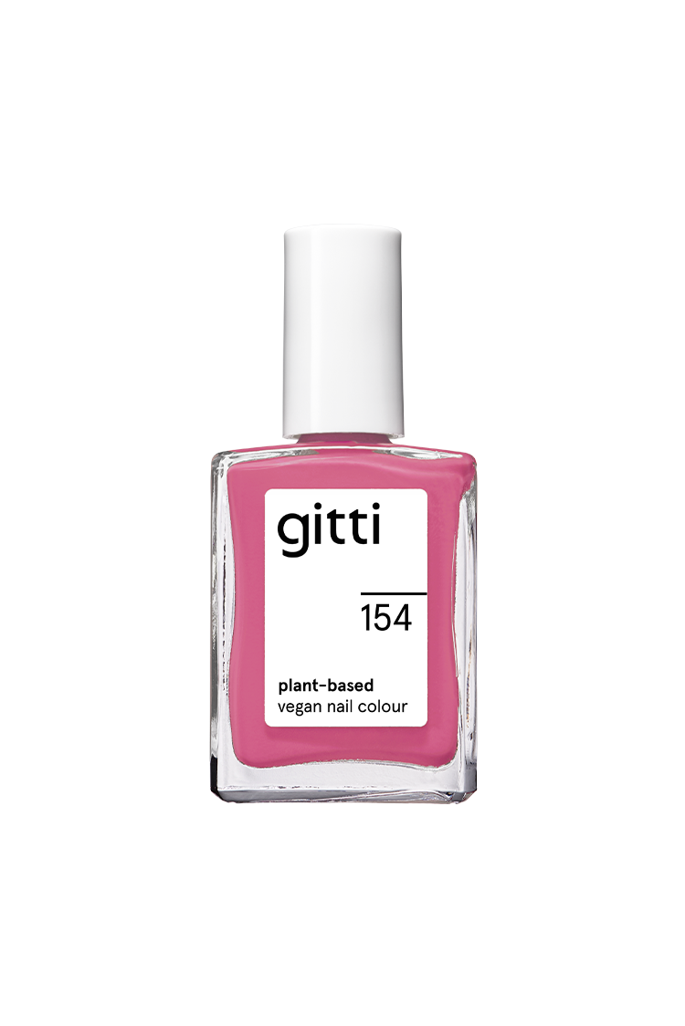 Eine Klarglasflasche mit gitti no. 154, eine vegane Nagelfarbe auf Pflanzenbasis in warmem Rosa mit weißer Kappe.
