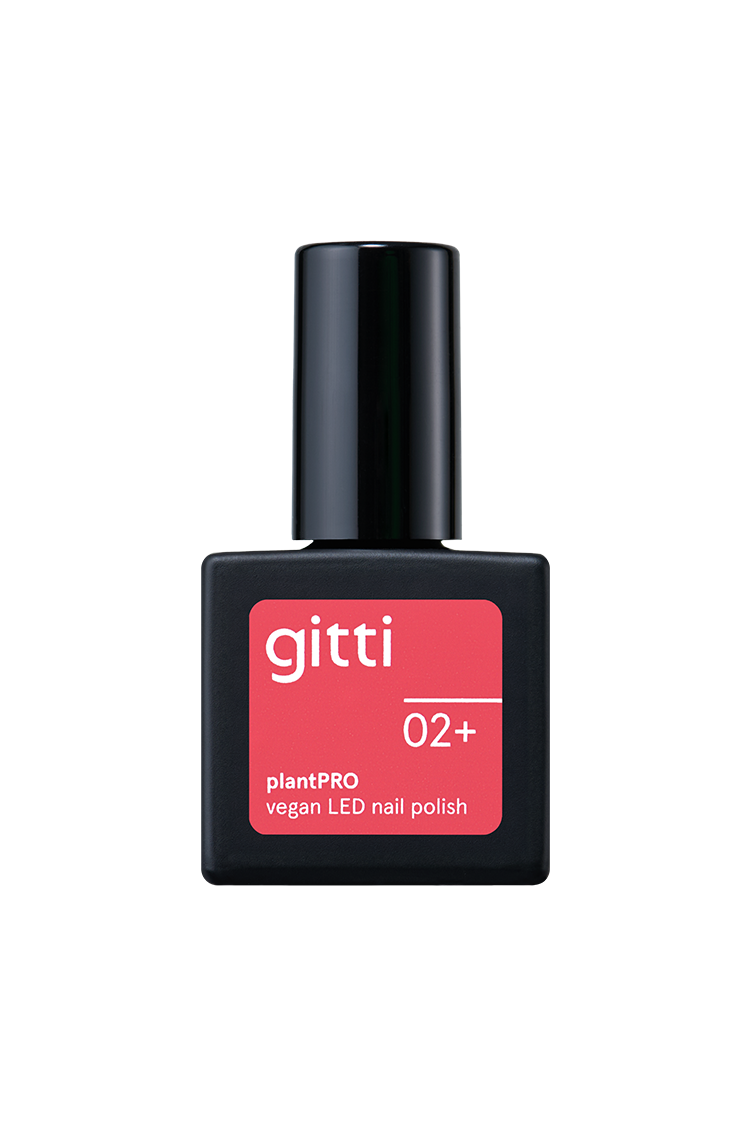 Eine Flasche gitti no. 02+, ein pflanzlicher, veganer LED-Nagellack in leuchtendem Koralle mit warmem Unterton, mit schwarzer Kappe und rotem Frontetikett.