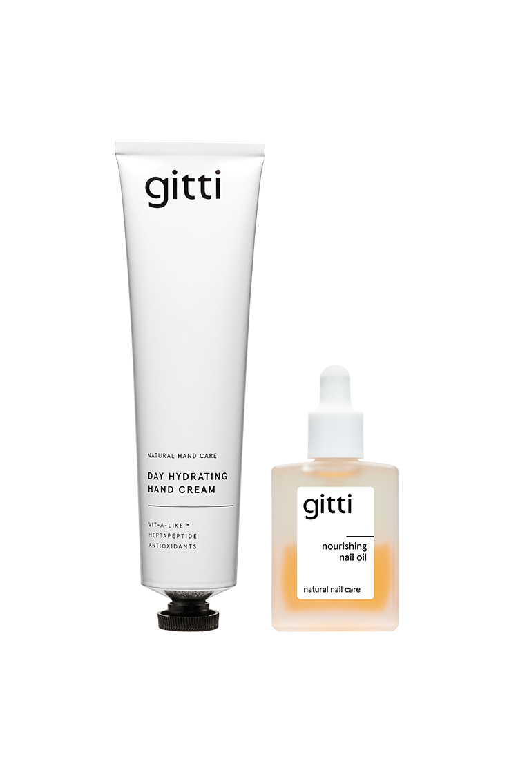 Eine weiße Tube mit der Aufschrift Be A Softie steht neben einer kleinen Flasche Nourishing Nail Oil und bildet ein ideales Duo für die tägliche Hand- und Nagelpflege.